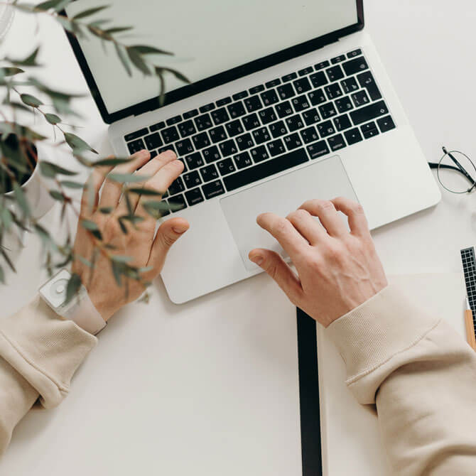 Digital marketing professional working on laptop for online business growth